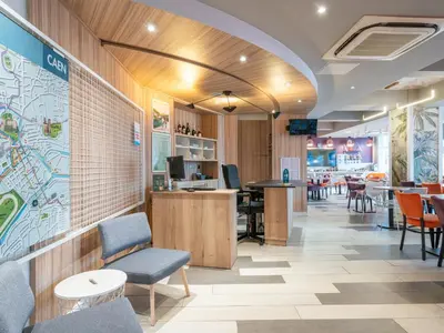 Restaurant ou autre lieu de restauration dans l'établissement B&B HOME Caen Centre Gare