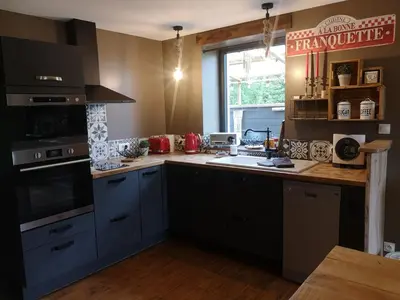 Cuisine ou kitchenette dans l'établissement Gîte La Grange de La Trigalle avec spa professionnel privatif
