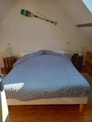 Un ou plusieurs lits dans un hébergement de l'établissement Gîte proche de la Pointe du Hoc CRICQUEVILLE EN BESSIN