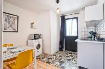 Cuisine ou kitchenette dans l'établissement Le petit Studio proche gare