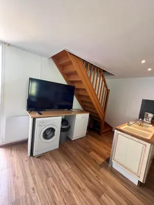 Télévision ou salle de divertissement dans l'établissement Gîte le parc Michel