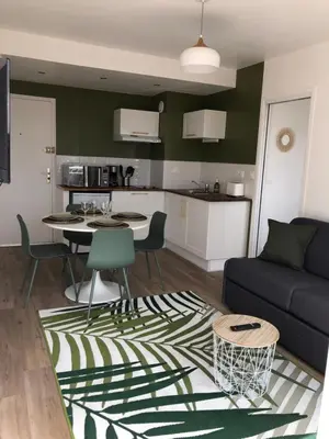 Cuisine ou kitchenette dans l'établissement Le 84