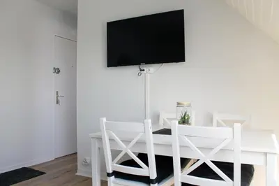 Télévision ou salle de divertissement dans l'établissement Cabourg - Studio cosy à 1 min de la plage