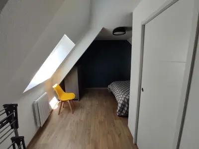 Un ou plusieurs lits dans un hébergement de l'établissement Appartement 5 Cherbourg centre avec NETFLIX et WIFI