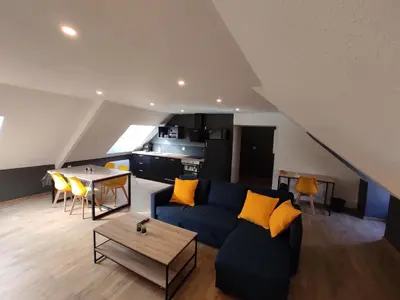 Coin salon dans l'établissement Appartement 5 Cherbourg centre avec NETFLIX et WIFI