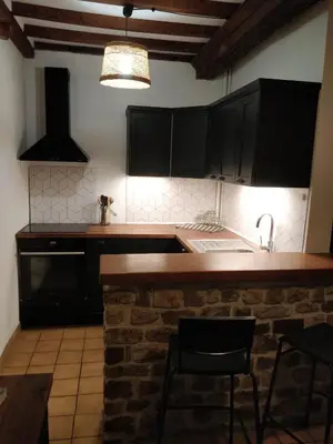 Cuisine ou kitchenette dans l'établissement Le Portail Du Mont