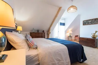 Un ou plusieurs lits dans un hébergement de l'établissement La Bellevue Bréville - B&B