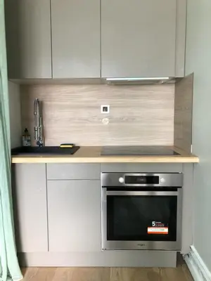 Cuisine ou kitchenette dans l'établissement soleil et bateau