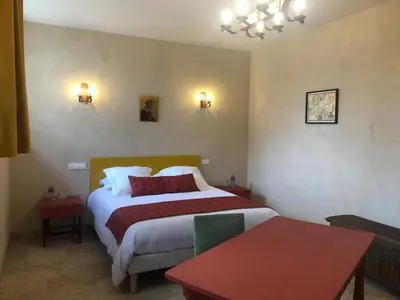 Un ou plusieurs lits dans un hébergement de l'établissement chambre d'hôtes Le Domaine de la Vallée