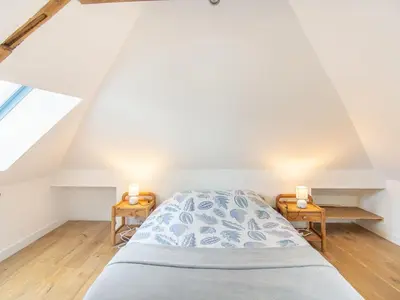 Un ou plusieurs lits dans un hébergement de l'établissement Apartment Le point du jour 2 by Interhome