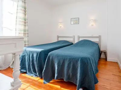 Un ou plusieurs lits dans un hébergement de l'établissement Holiday Home Le Colibri by Interhome
