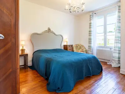 Un ou plusieurs lits dans un hébergement de l'établissement Holiday Home Le Colibri by Interhome