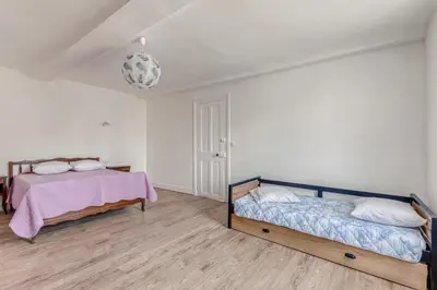 Un ou plusieurs lits dans un hébergement de l'établissement Hamo - Maison à 600 m de la plage