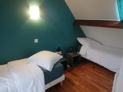 Un ou plusieurs lits dans un hébergement de l'établissement Maison de charme vue sur mer pour 6 pers