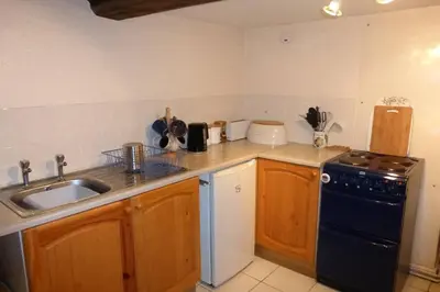 Cuisine ou kitchenette dans l'établissement Les Deux Sabots