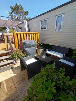 Balcon ou terrasse dans l'établissement La Chanterie Agréable Mobil-Home Résidentiel Normand