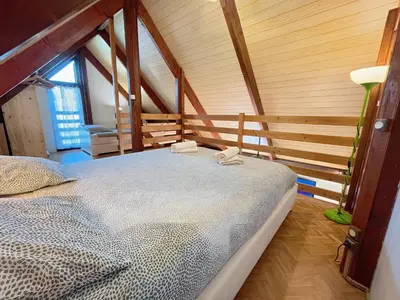 Un ou plusieurs lits dans un hébergement de l'établissement Chaleureux chalet à 3 minutes à pied de la mer - Parking gratuit