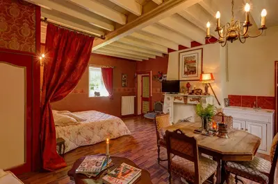 Un ou plusieurs lits dans un hébergement de l'établissement Chateau Le Val