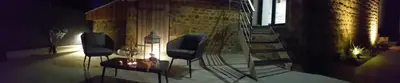 Coin salon dans l'établissement Le Ptit Spa de L'Abbaye Suite love et Spa privé