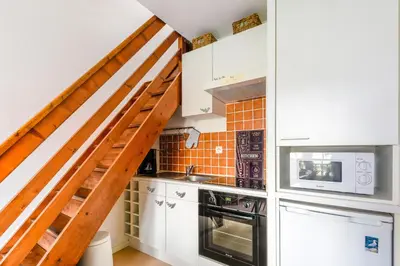 Cuisine ou kitchenette dans l'établissement Le Voilier