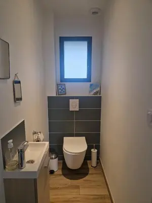 Salle de bains dans l'établissement Maison Les Dunes Bourgales