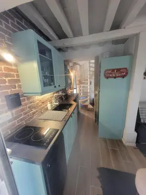 Cuisine ou kitchenette dans l'établissement Domaine 