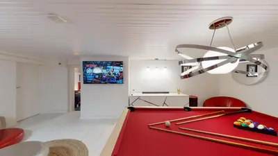 Télévision ou salle de divertissement dans l'établissement Villa Amare Granville