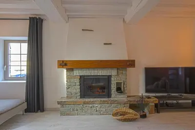 Télévision ou salle de divertissement dans l'établissement GÎTE de la Bertinière