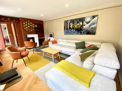Coin salon dans l'établissement Le Capella, magnifique maison au calme avec garage
