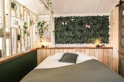 Un ou plusieurs lits dans un hébergement de l'établissement Chalet Nature & Spa