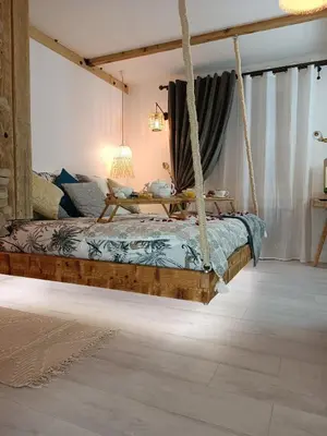 Un ou plusieurs lits dans un hébergement de l'établissement Le Maréchal Duplex - Appartement avec Jacuzzi - CAEN hyper Centre