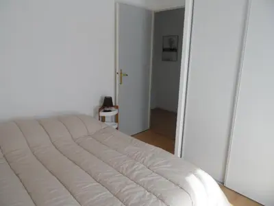 Un ou plusieurs lits dans un hébergement de l'établissement Cottage 3 pièces à Dives-sur-Mer, jardin privé, proche Port Guillaume, piscine, animaux acceptés - FR-1-487-301