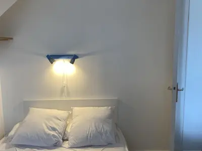 Un ou plusieurs lits dans un hébergement de l'établissement Appartement 2 Pièces à Cabourg, Proche Plage et Thalasso, Balcon, Wifi, 4 Pers - FR-1-487-315