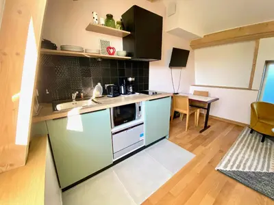 Cuisine ou kitchenette dans l'établissement Ogma, Studio coquet au calme