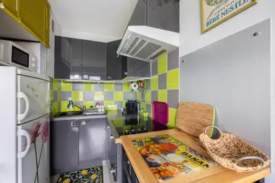 Cuisine ou kitchenette dans l'établissement Le Pavillon - Appartement à 30 m de la plage