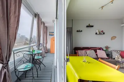 Coin salon dans l'établissement Le Pavillon - Appartement à 30 m de la plage