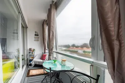 Balcon ou terrasse dans l'établissement Le Pavillon - Appartement à 30 m de la plage