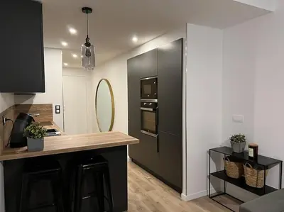 Cuisine ou kitchenette dans l'établissement Appart Cosy emplacement N1 Théâtre