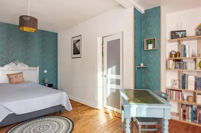 Un ou plusieurs lits dans un hébergement de l'établissement La Jeannette - maison avec jardin