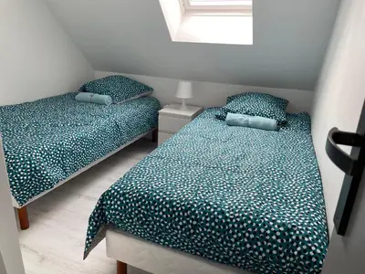 Un ou plusieurs lits dans un hébergement de l'établissement La Dunette Port Guillaume - Cabourg -piscine et mer à pied