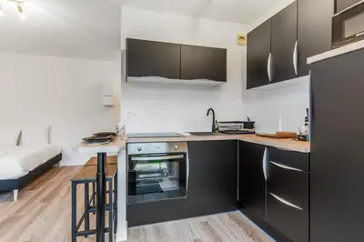 Cuisine ou kitchenette dans l'établissement Studio Aristide - Welkeys