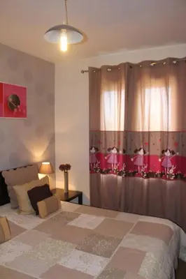 Un ou plusieurs lits dans un hébergement de l'établissement Appartement charmant au cœur de Caen - 70 m² - Parking inclus