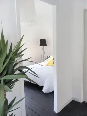 Un ou plusieurs lits dans un hébergement de l'établissement Appartement moderne à Granville - 55 m² - Vue sur mer