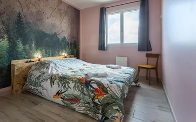 Un ou plusieurs lits dans un hébergement de l'établissement Babord, appt avec terrasse et vue mer