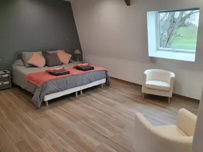 Un ou plusieurs lits dans un hébergement de l'établissement gite du château