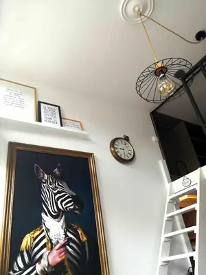 Télévision ou salle de divertissement dans l'établissement L'INTIMISTE à Saint Lô - Atypique - Studio Duplex Privé tout équipé - Gare - Centre - Parking gratuit - Entrée autonome - Chambre en mezzanine - Wifi - Netflix - Lave-linge