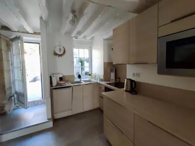 Cuisine ou kitchenette dans l'établissement La Nacre de Saint Aubin sur Mer