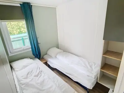 Un ou plusieurs lits dans un hébergement de l'établissement Mobil-Home Grand Confort 4 Pers. à 200m de la plage avec piscine chauffée et parking - FR-1-361A-15