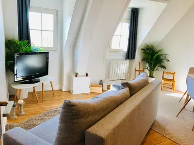 Télévision ou salle de divertissement dans l'établissement APPARTEMENT 4/6p Haut Standing / Centre ville CAEN