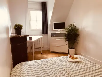 Un ou plusieurs lits dans un hébergement de l'établissement APPARTEMENT 4/6p Haut Standing / Centre ville CAEN